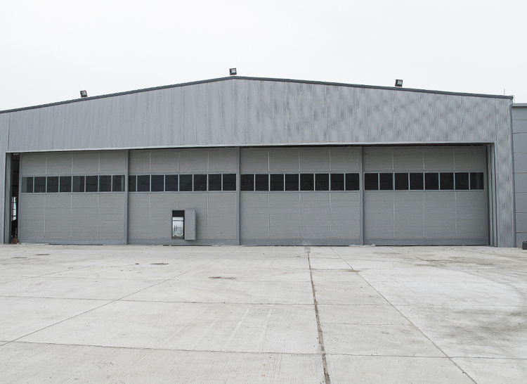 1654069379379458.jpg 通遼飛機(jī)庫(kù)門(mén).jpg