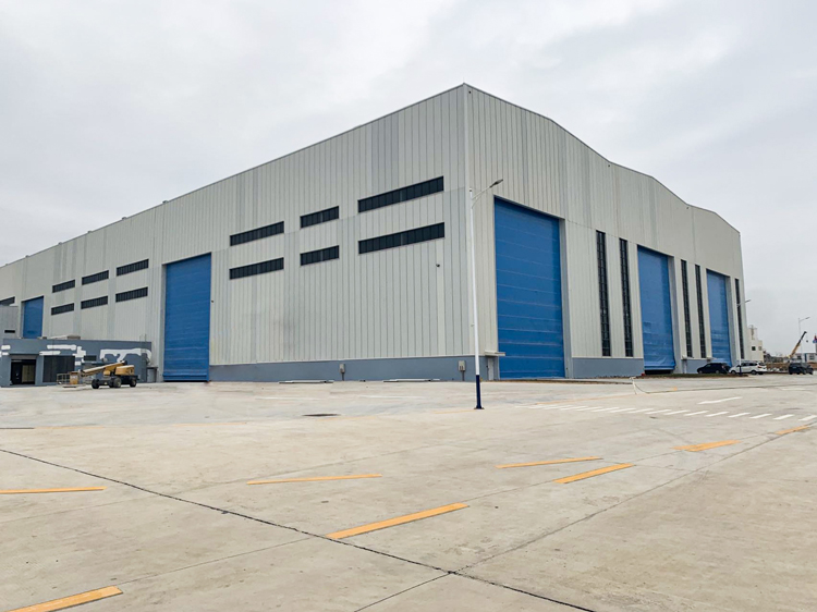 1654070471937344.jpg 廣東揭陽(yáng)通用廠房柔性上疊門.jpg